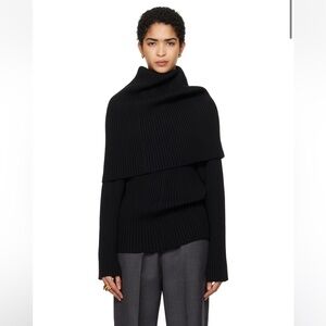 ALAINPAUL
Black Covered Shoulders Turtleneck